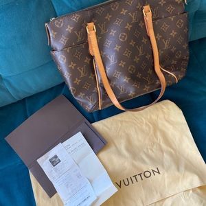 Louis Vuitton over the shoulder bag